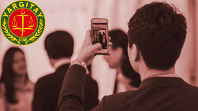 Yargıtay, gizlice iş arkadaşının fotoğraflarını çeken sanığın cezasını onadı!